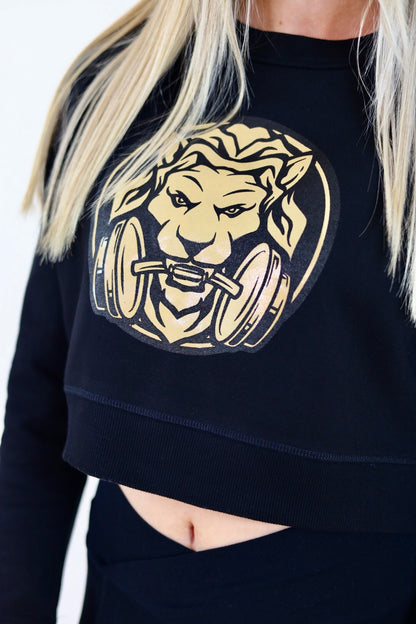 Close-up of black Lioness Cropped Crewneck Jumper with detailed lioness logo, showcasing premium quality and stylish design for women.